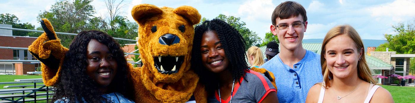 First year students pose with the Nittany Lion during orientation